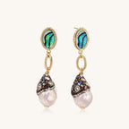 Gold-plated statement earrings with iridescent abalone shells, rope chain links, and crystal-capped baroque pearls