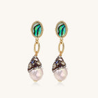 Gold-plated statement earrings with iridescent abalone shells, rope chain links, and crystal-capped baroque pearls