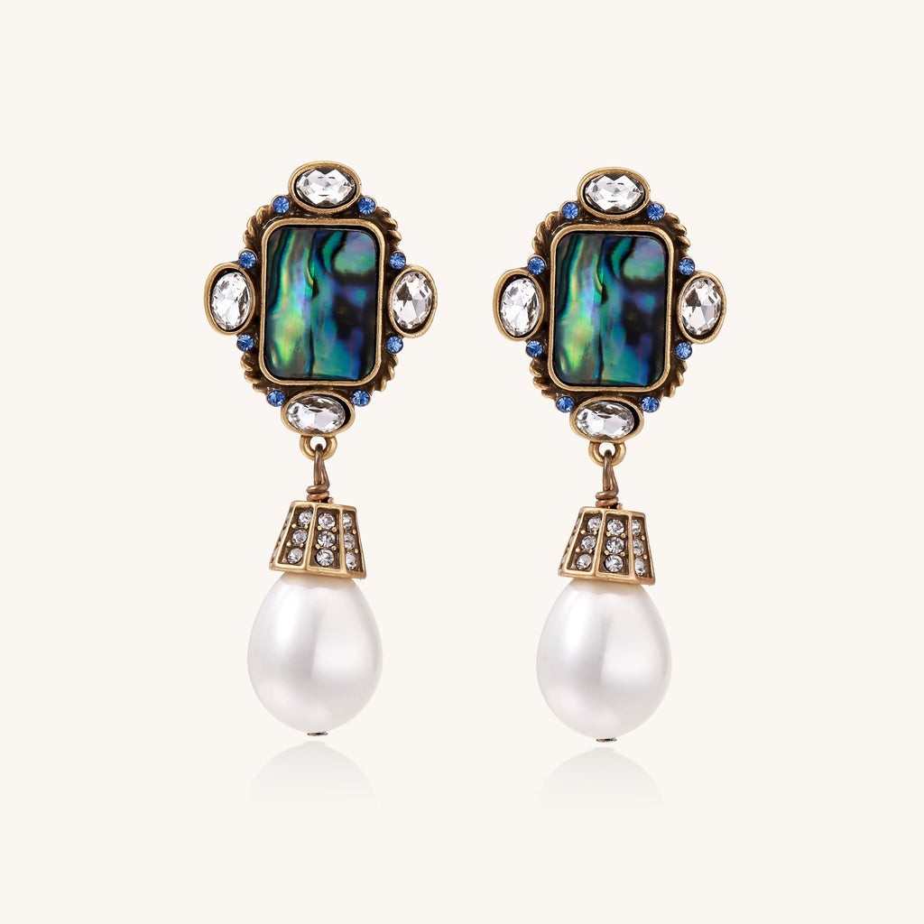 Gold-plated brass drop earrings featuring iridescent abalone shell centers, crystal accents, and white pearl drops.