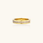 14K gold plated ring with channel-set zirconia stones and Greek key pattern engraved on sides on white background